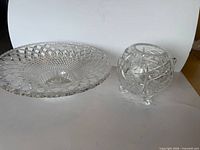 Both crystal compote bowls side by side