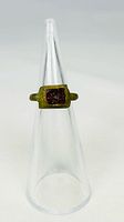 Front view showing square bezel and red glass intaglio