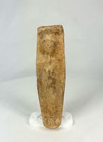 Front view of full terracotta figure showing overall form and patina