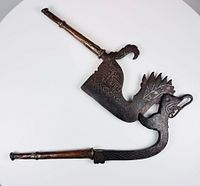 Cigar cutter folded and unfolded showing entire form and handles