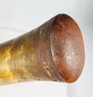 Close-up of wooden base plug on wide end of horn