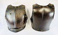 Front view showing both breastplate and backplate with brass studs