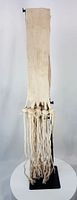 Front view of full sash on stand showing woven band and tassels