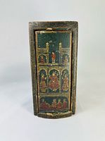 Painted palace scene on sliding lid of storage box