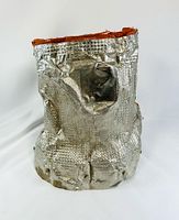 Front view of reflective insulation blanket showing overall form and orange interior