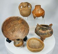 Frontal group shot of all six ceramic pieces