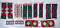 Overview of fourteen Pueblo dance anklets showing seven stylistic pairs