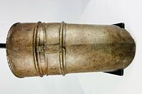 upper cannon front view showing ridged deflector and patina