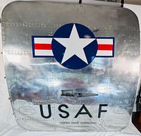 Front view showing full cargo door panel with USAF markings and latch