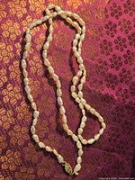 Full view of pearl necklace laid out