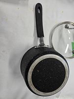 Bottom view of saucepan showing speckled finish and induction-ready base