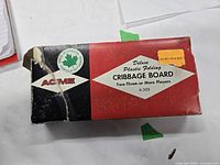 Acme branded retail box front showing model and branding