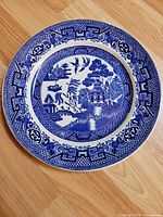 Full view of Blue Willow plate front, shows pattern and border