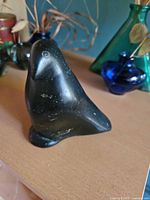 Front three-quarter view of soapstone bird figurine