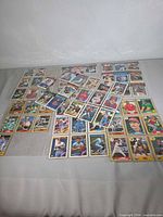 Overview of all cards spread out with sleeves
