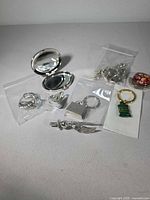 Overview of compact mirrors, keychains, rings, charm bags