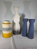 Group shot of all four ceramic pieces