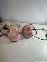 Two salt lamps with cords