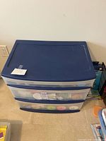 Front view of Sterilite 3-drawer storage filled with ribbon
