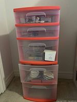 Front view of five-drawer plastic tower