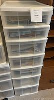 Front view of seven-drawer plastic storage cabinet