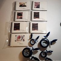 All items overview – 7 photo albums and 4 craft punches alongside ruler for scale