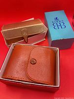 Birks blue retail box, Birks fitted tan case, Minor brown leather pouch