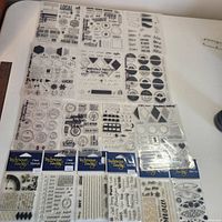 All 16 cling stamp sets arranged on table
