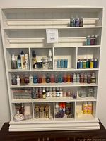 Full view of shelf with all craft supplies loaded