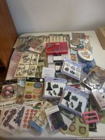 Overview of all embellishment packages spread on table