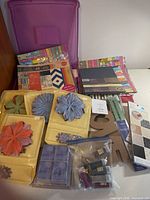 Overall view of storage case, paper pads, embellishments and other items