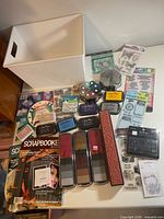 Full lot overview with ink pads, stamps, magazines, color wheel and storage bin