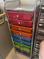Full view of chrome frame rolling cart with ten coloured drawers