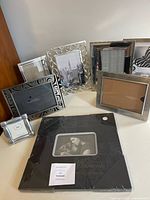 All eight frames grouped on tabletop