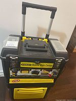 Front view of Stanley rolling toolbox with handle extended