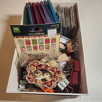 boxed view showing albums, frames, sticker pack and clips