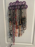 Full view of hanger with all necklaces displayed