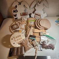 Overall view of all wooden crafting items laid on table