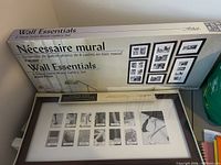 Box for Fetco Wall Essentials 6-piece solid wood gallery set and boxed School Days collage frame visible