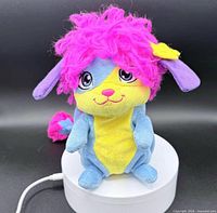 Front view of Popples Lulu plush toy standing