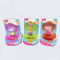 Front view of three sealed Seashell Surprise packages showing dolphin, mermaid and turtle sets