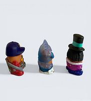 Rear view of all three McNugget Buddy figures displaying costume backs and colours