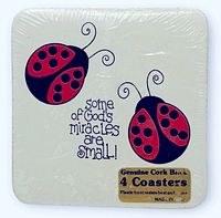 front view showing ladybug design, text, and gold label on sealed pack