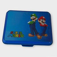 Front view of blue hard case showing Mario, Luigi and Super Mario logo
