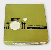 Closed green box labeled Oneida Stainless Solid Stainless Steel
