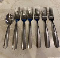 Front view of 5 forks and 1 teaspoon