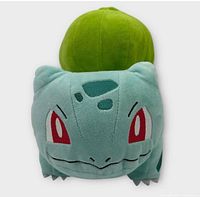 Front view of Bulbasaur plush showing face and body
