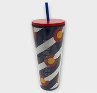 Full view of tumbler showing Colorado flag design, red lid, blue straw