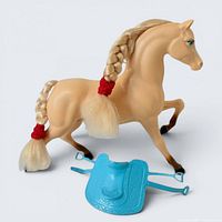 Full view of Barbie horse with saddle accessory