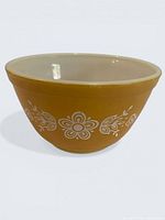 Side view showing Butterfly Gold floral pattern and white interior